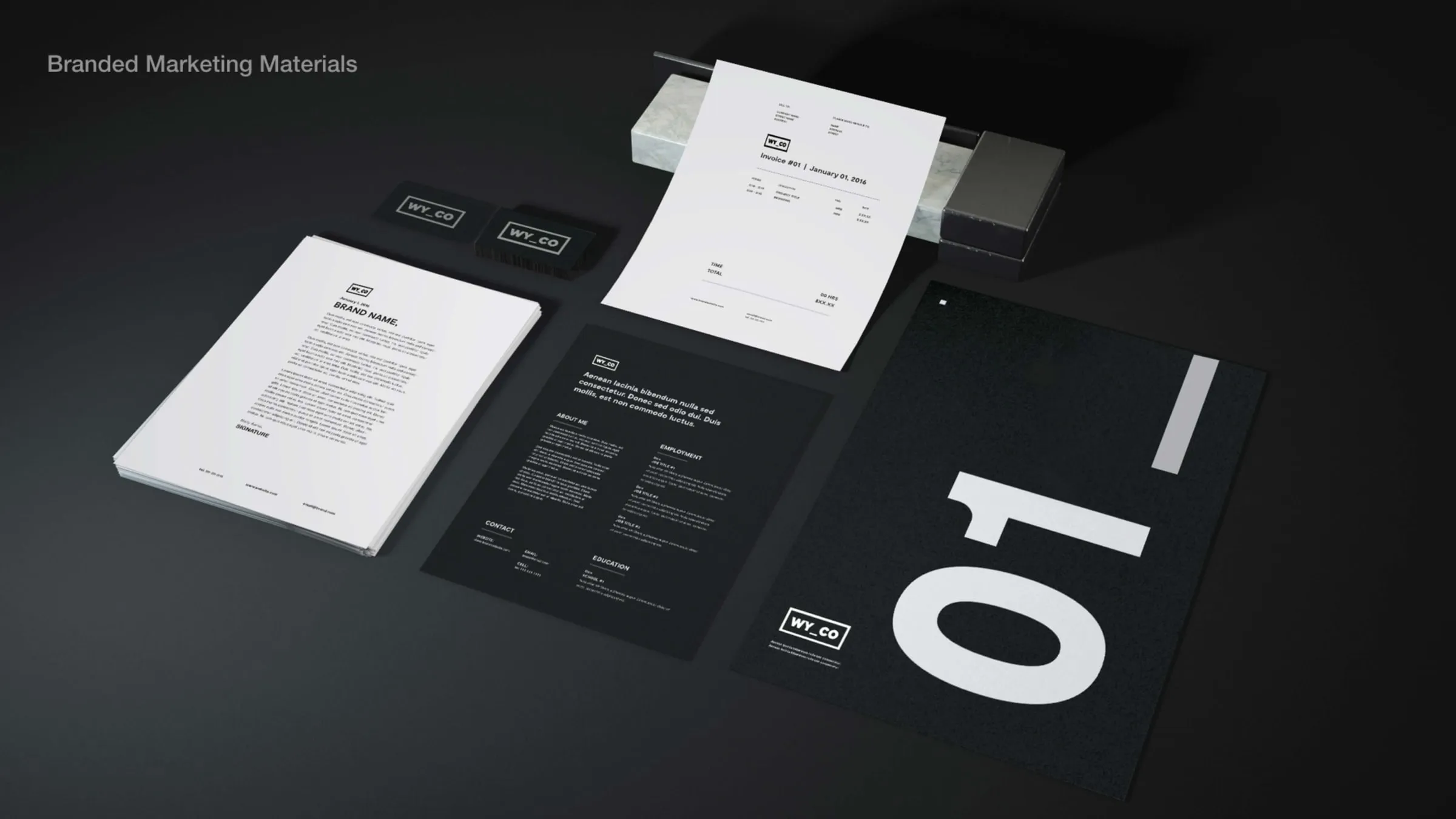 WYCO stationery: letterhead, envelope and notebook in black and white