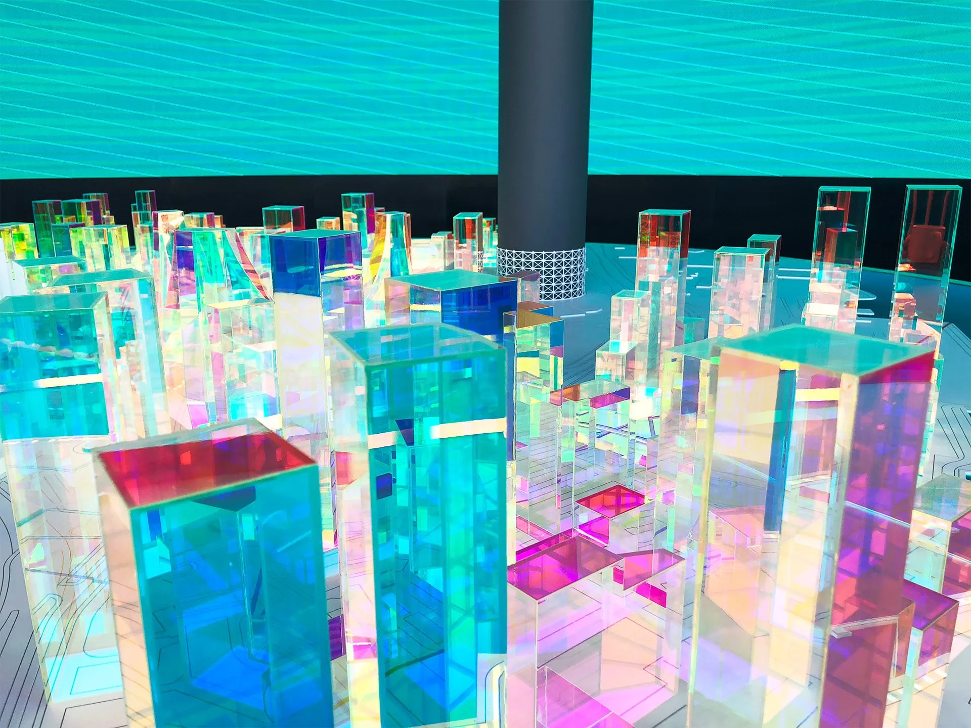 Close-up of iridescent, light-filled building blocks on the model