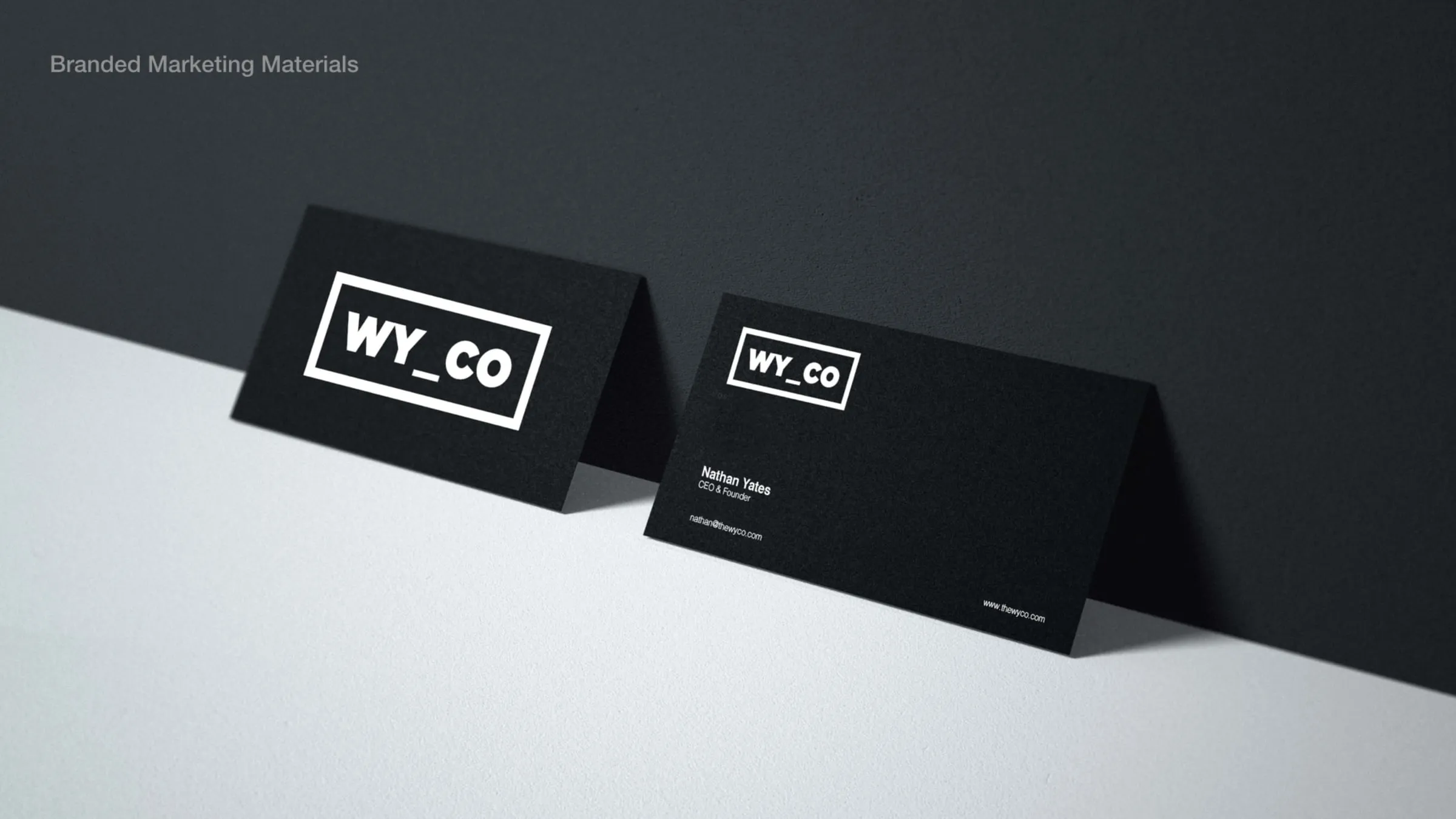 WYCO business cards on a grey surface