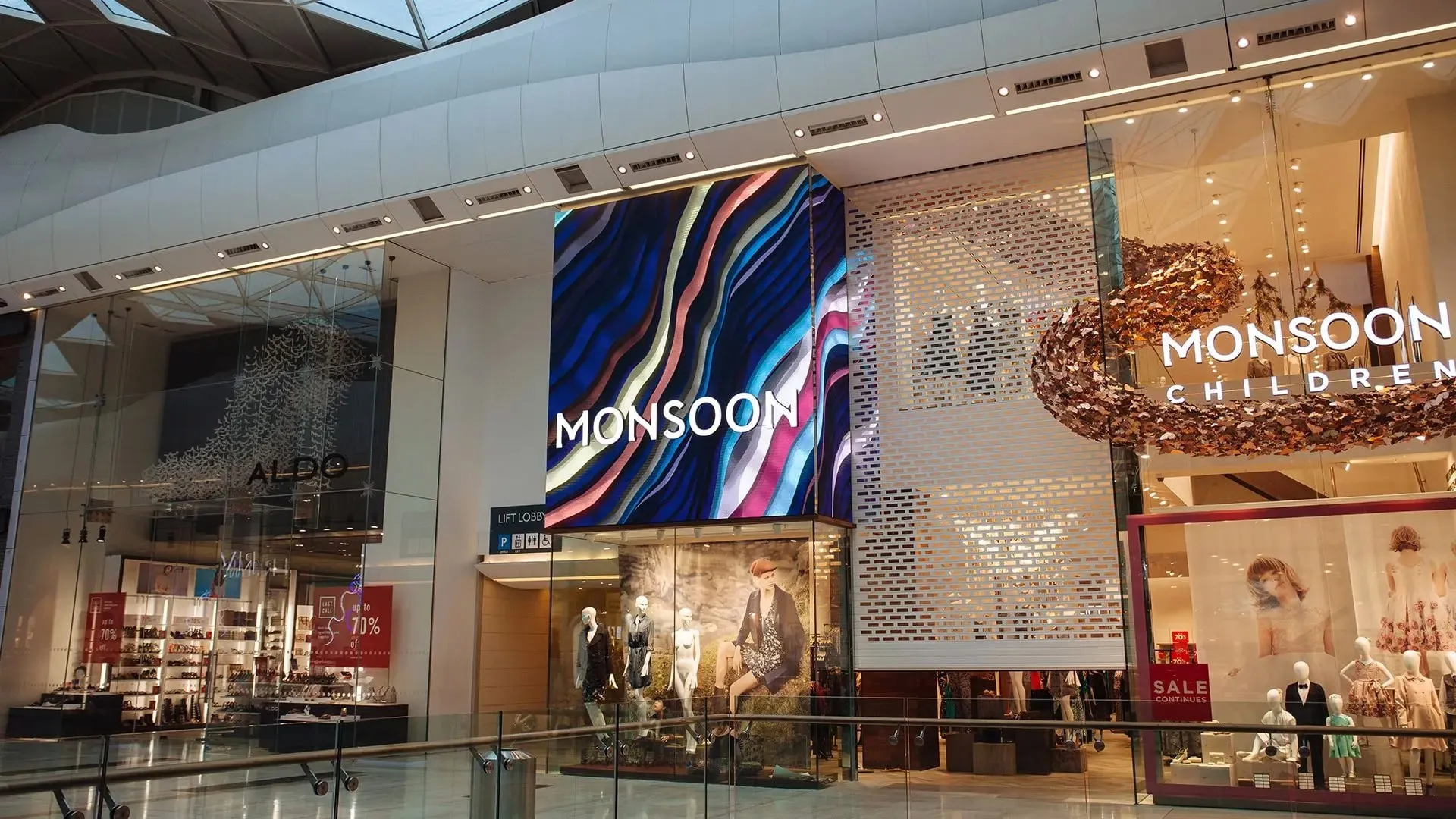 The Monsoon flagship store front at Westfield London with its digital display